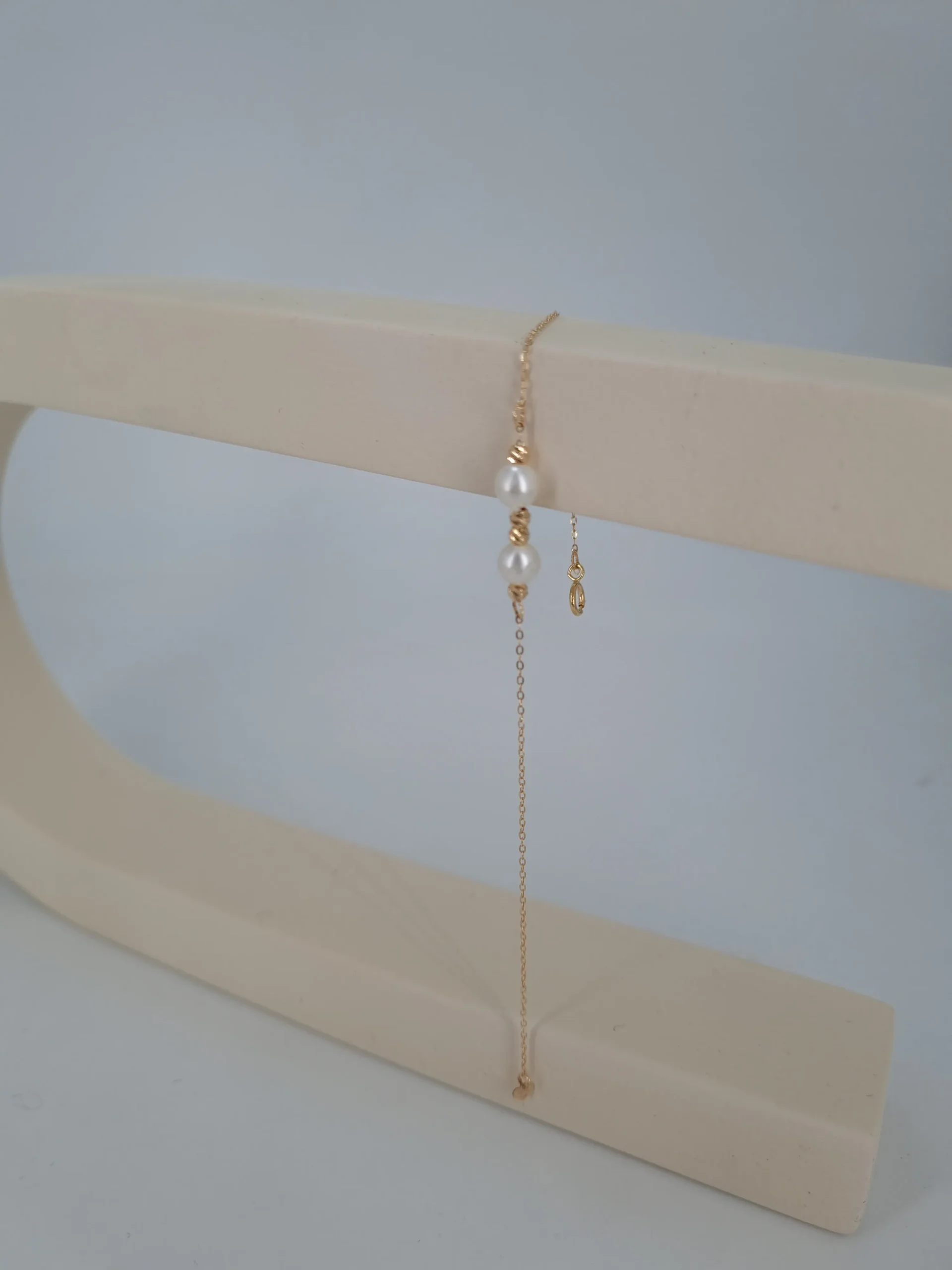 دستبند طلای دو مروارید